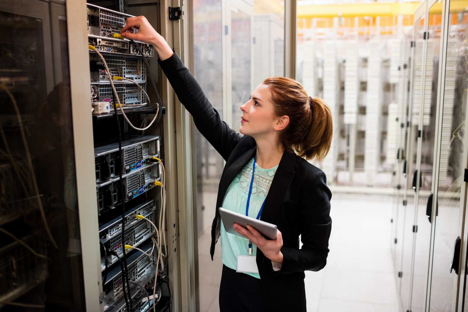 iStock-653355524 - caucasian girl server room v2 1920